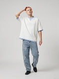 DAXUEN white oversized layered-look top with striped collar — model photo