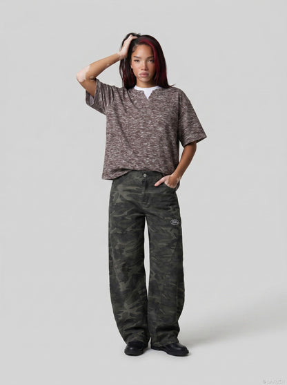 DAXUEN Layered neckline short-sleeved top in heathered fabric — model photo