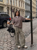 DAXUEN Layered neckline short-sleeved top in heathered fabric — model photo