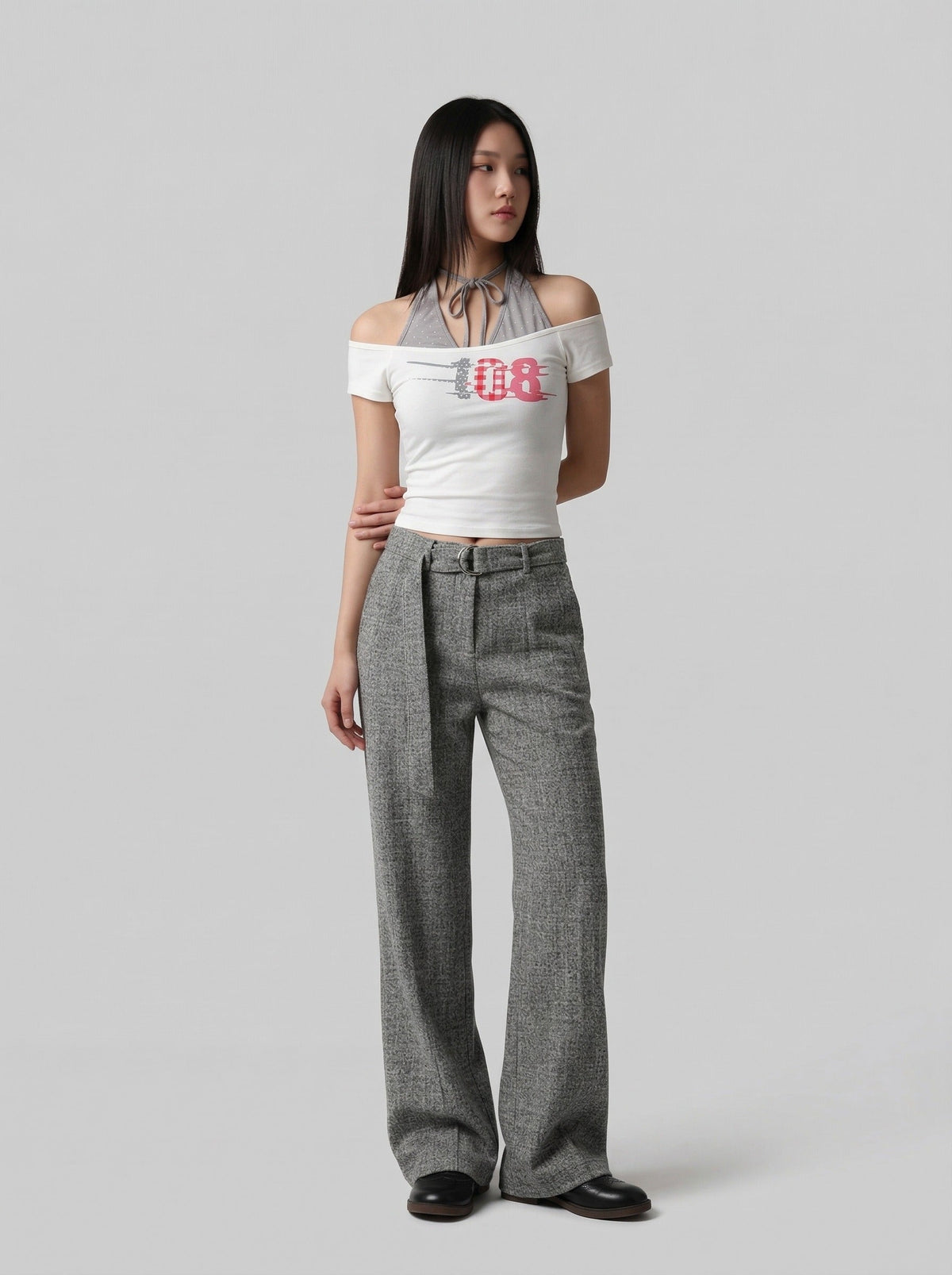 DAXUEN Layered women's off-shoulder graphic top — model photo