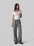 DAXUEN Layered women's off-shoulder graphic top — model photo