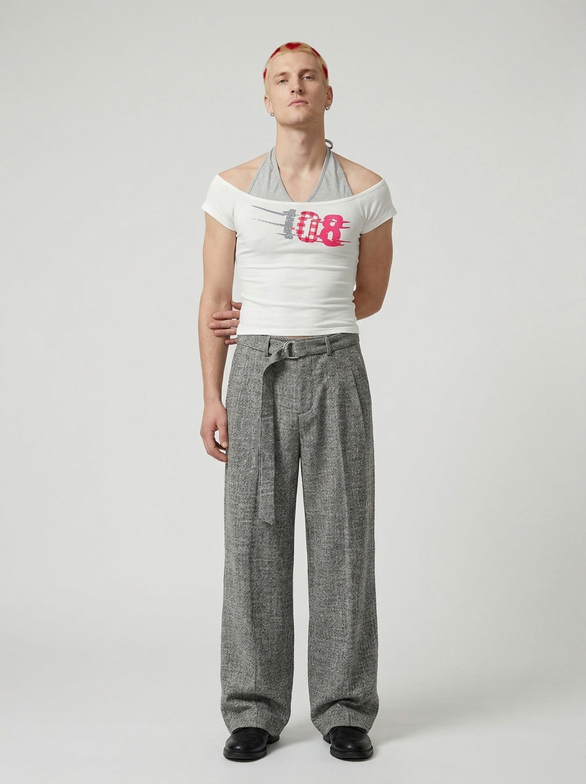 DAXUEN Layered women's off-shoulder graphic top — model photo