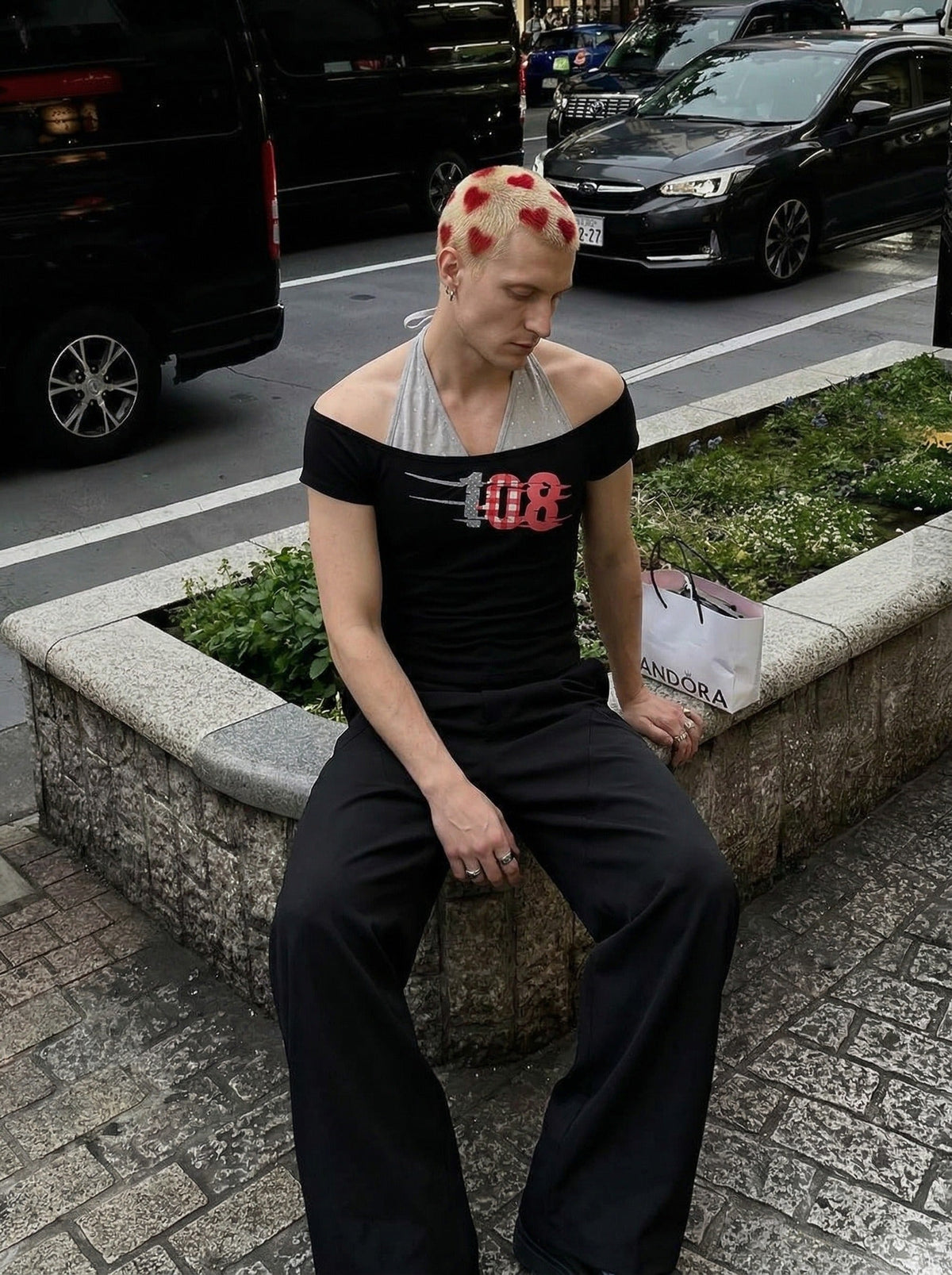 DAXUEN Layered women's off-shoulder graphic top — model photo