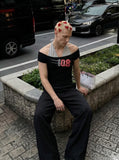 DAXUEN Layered women's off-shoulder graphic top — model photo