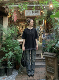 DAXUEN Layered oversized short-sleeve T-shirt with plaid detail — model photo
