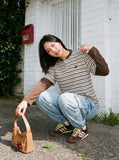 DAXUEN layered striped henley graphic tee — model photo
