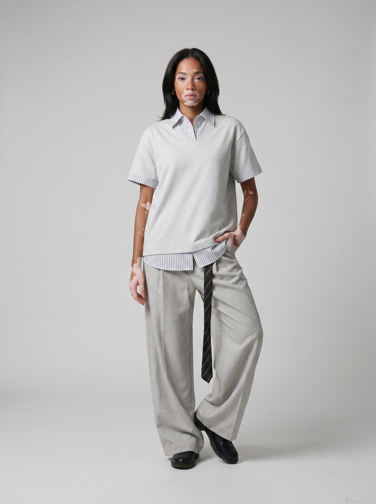 DAXUEN Layered V-neck short sleeve top with striped inner shirt — model photo
