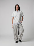DAXUEN Layered V-neck short sleeve top with striped inner shirt — model photo