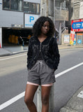 DAXUEN Layered women's athletic shorts — model photo