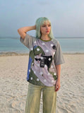 DAXUEN Oversized short-sleeved T-shirt with cat graphic — model photo