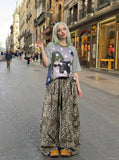 DAXUEN Oversized short-sleeved T-shirt with cat graphic — model photo