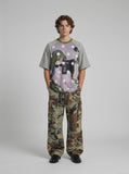 DAXUEN Oversized short-sleeved T-shirt with cat graphic — model photo