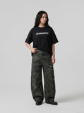 DAXUEN Oversized Geometric Logo Tee — model photo