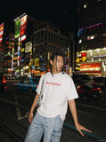 DAXUEN Oversized Geometric Logo Tee — model photo