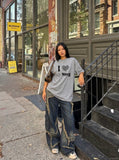 DAXUEN Leopard print graphic oversized T-shirt — model photo