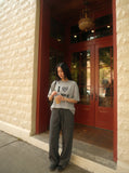 DAXUEN Leopard print graphic oversized T-shirt — model photo