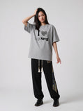 DAXUEN Leopard print graphic oversized T-shirt — model photo