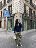 DAXUEN camouflage cargo pants with leopard print panel — model photo