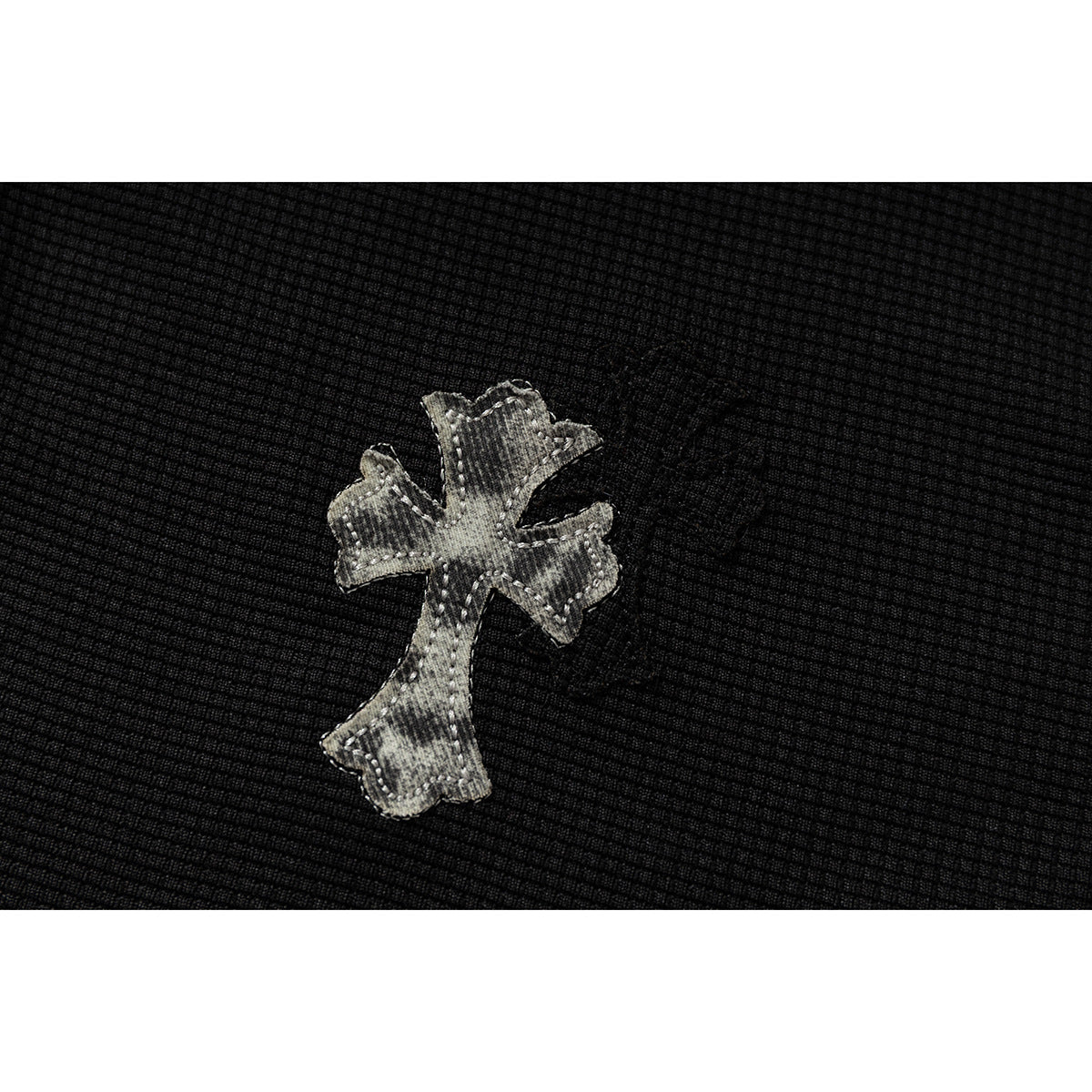 DAXUEN black polo shirt with leopard print collar and cross graphic