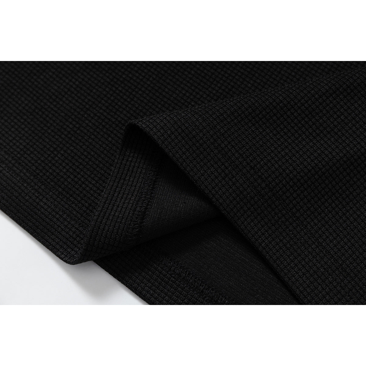 DAXUEN black polo shirt with leopard print collar and cross graphic