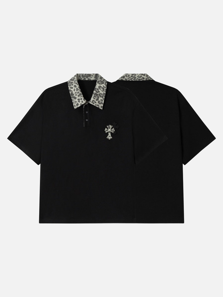 DAXUEN black polo shirt with leopard print collar and cross graphic