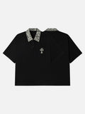 DAXUEN black polo shirt with leopard print collar and cross graphic