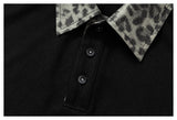 DAXUEN black polo shirt with leopard print collar and cross graphic