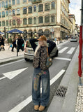 DAXUEN Wide-leg denim jeans with leopard print and stars — model photo