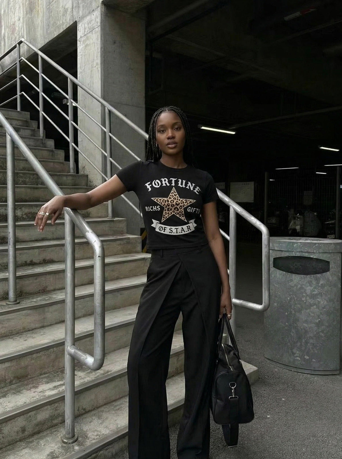 DAXUEN Leopard star graphic t-shirt with gothic text — model photo