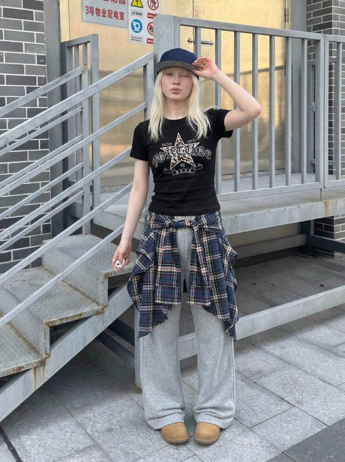 DAXUEN Leopard star graphic t-shirt with gothic text — model photo