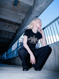 DAXUEN Leopard star graphic t-shirt with gothic text — model photo