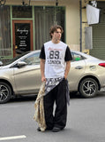 DAXUEN Faux-layered short-sleeved graphic t-shirt — model photo