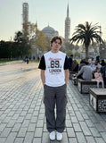 DAXUEN Faux-layered short-sleeved graphic t-shirt — model photo