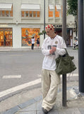 DAXUEN light beige wide-leg cargo pants — model photo