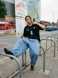 DAXUEN light blue balloon pants with button placket — model photo