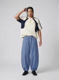 DAXUEN light blue balloon pants with button placket — model photo