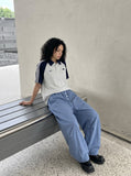 DAXUEN light blue balloon pants with button placket — model photo