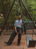 DAXUEN light blue denim shirt with pink collar and embroidered details — model photo