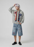 DAXUEN Light blue washed denim wide-leg shorts with graphic prints — model photo