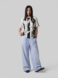 DAXUEN light blue oversized grid casual pants — model photo