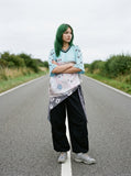 DAXUEN light blue oversized star-patterned jersey top — model photo