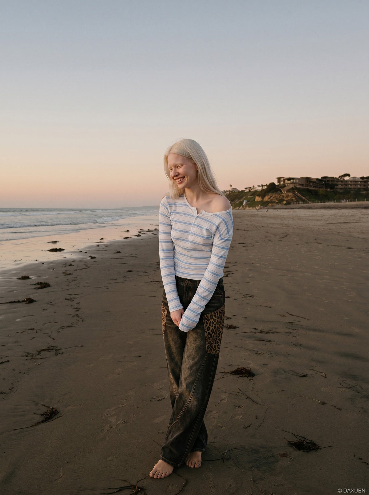 DAXUEN white lightweight knit top with light blue stripes — model photo