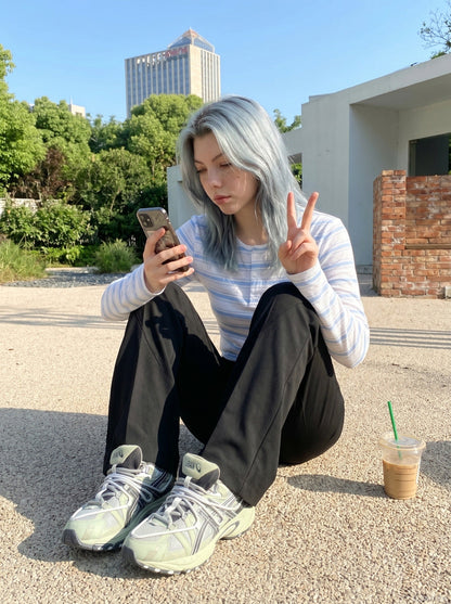 DAXUEN white lightweight knit top with light blue stripes — model photo