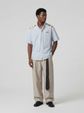 DAXUEN Light blue short-sleeved striped shirt with puppy embroidery — model photo