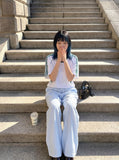 DAXUEN light blue vertical stripe wide-leg trousers — model photo