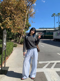 DAXUEN light blue vertical stripe wide-leg trousers — model photo