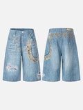 Light blue wide-leg denim culottes with abstract patterns