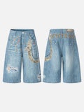 Light blue wide-leg denim culottes with abstract patterns