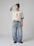 DAXUEN light blue oversized heart-stitched jeans — model photo