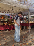 DAXUEN light blue oversized heart-stitched jeans — model photo